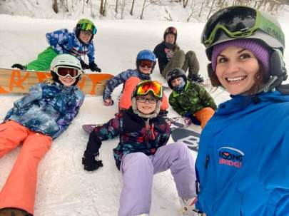 Instructor with kids in group lessons